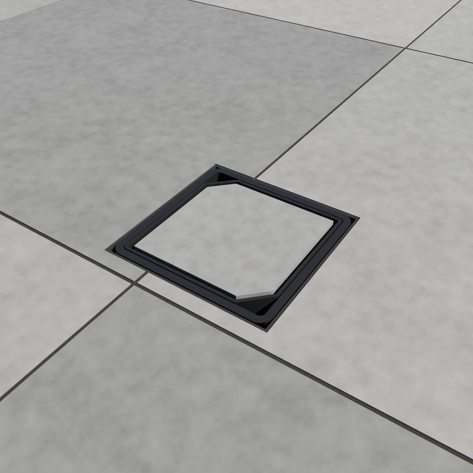 Recessed rodding cover kit installed in a grey porcelain patio, with the lid tray filled with a matching porcelain tile so the lid is nearly hidden and the thin black frame rim shows